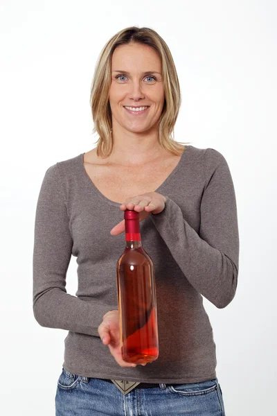 Žena s láhví vína — Stock fotografie