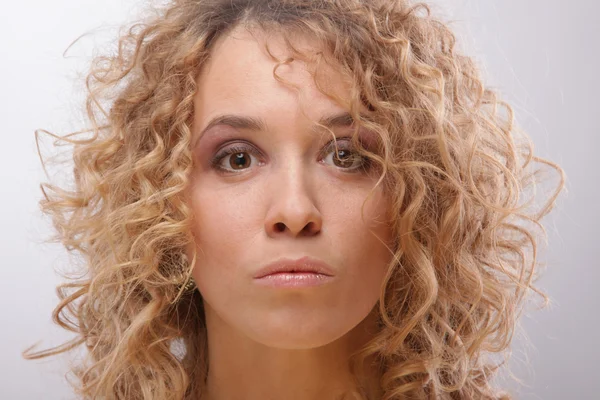 Serious curly women — Stock Photo, Image