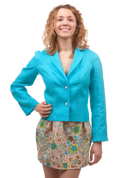 Schöne junge Frau mit blauem Mantel und farbigem Rock — Stockfoto