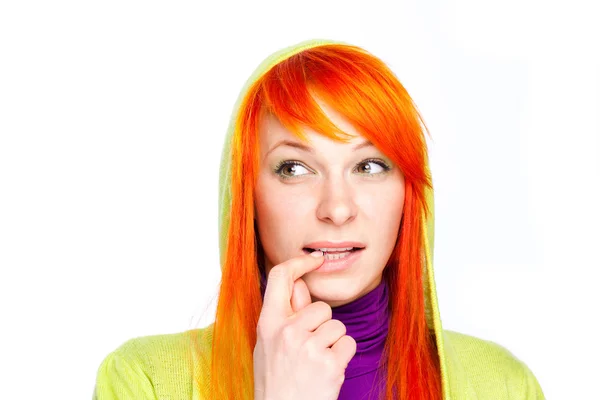 Red hair curious woman holding finger at mouth — Stock Photo, Image
