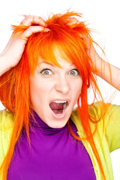 Shocked screaming woman holding red head with hands — Stock Photo, Image