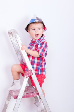 Little painter with open mouth on ladder clipart