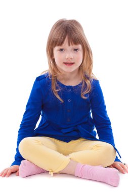 Blonde smiling little girl sitting clipart