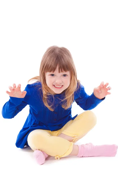 Blonde funny scaring little girl sitting — Stock Photo, Image