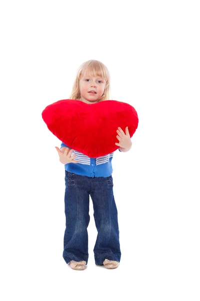 Menina com coração vermelho às mãos — Fotografia de Stock