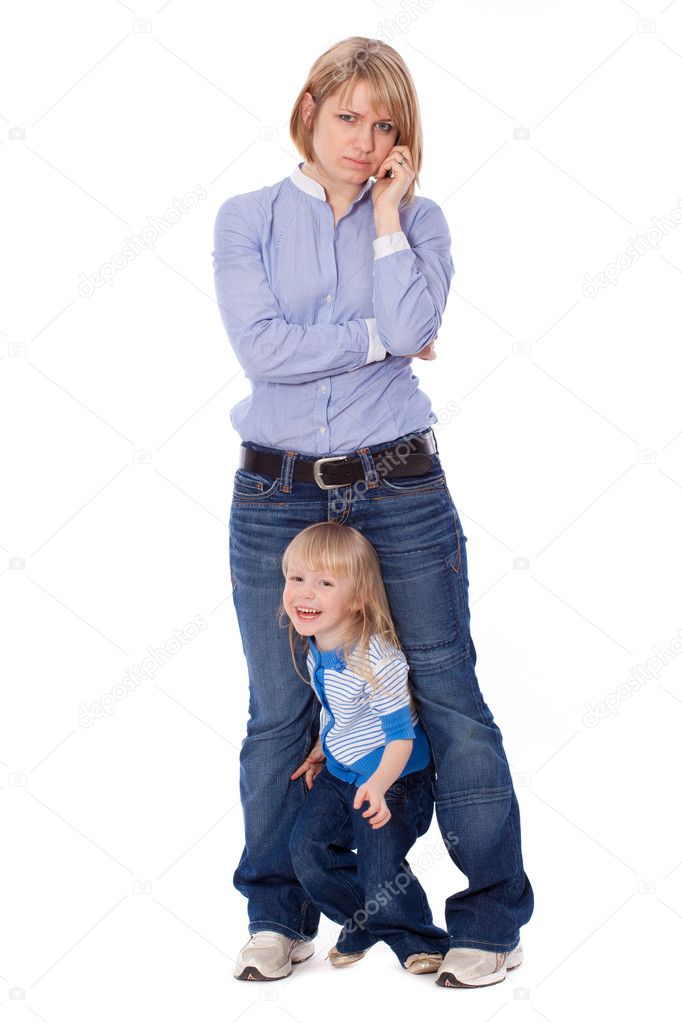 Playful child disturb mother to talk on cell