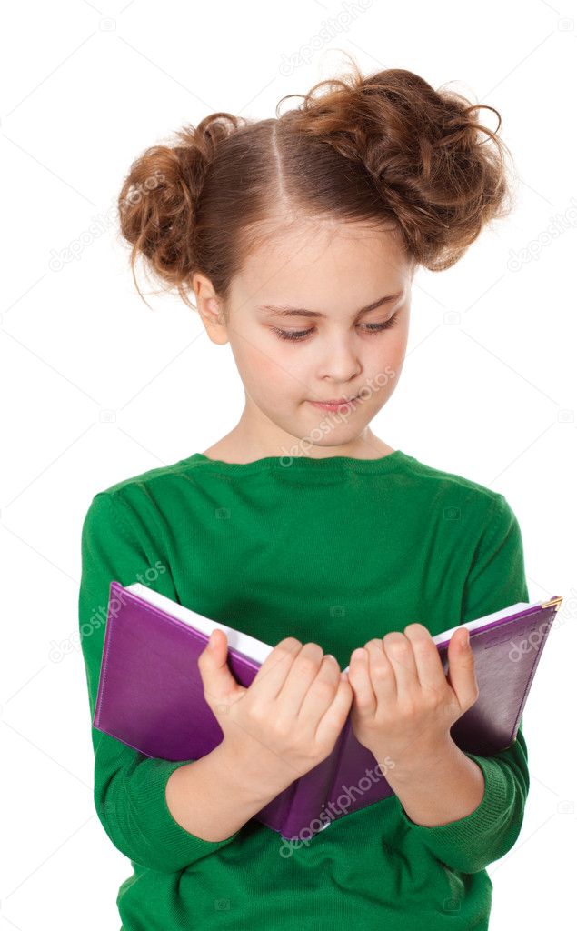 Interested girl reading book