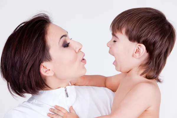 Happy smiling child and mom — Stock Photo, Image