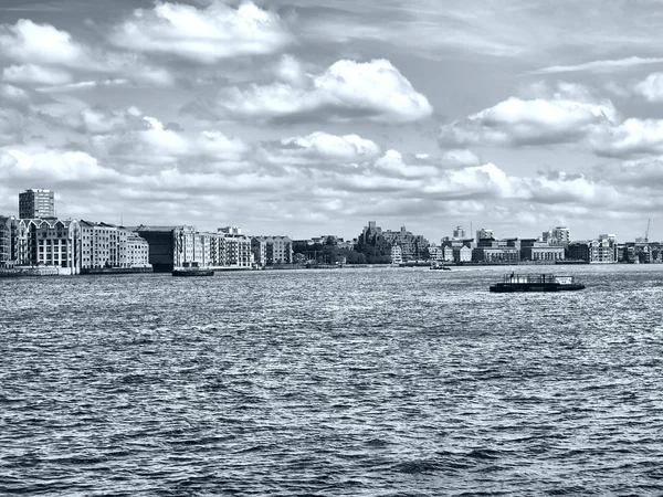 stock image Docks in London Docklands on River Thames, UK - high dynamic range HDR - black and white