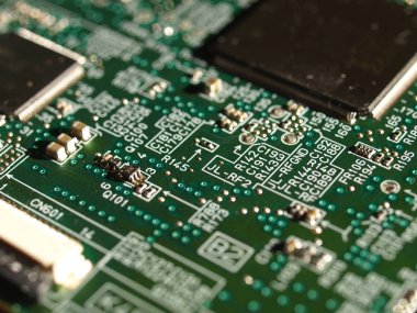 Detail of an electronic printed circuit board clipart