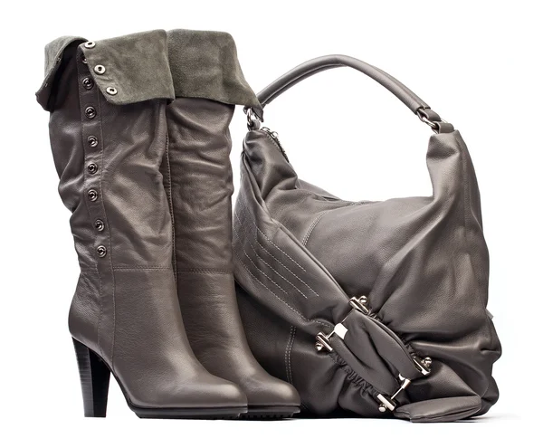 Gray female high-heeled boots and bag on the white background — Stock Photo, Image