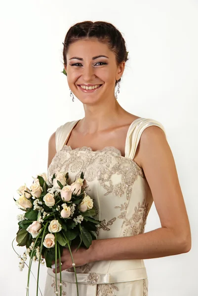 stock image Portrait of young beautiful bride with bouquet of roses, on the white background