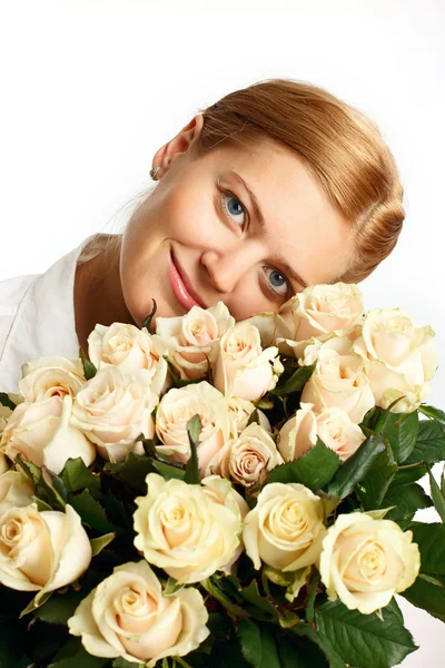 Young woman with bunch of roses — Stock Photo, Image
