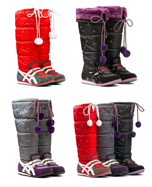 Kleurrijke vrouwelijke winter laarzen op de witte achtergrond — Stockfoto