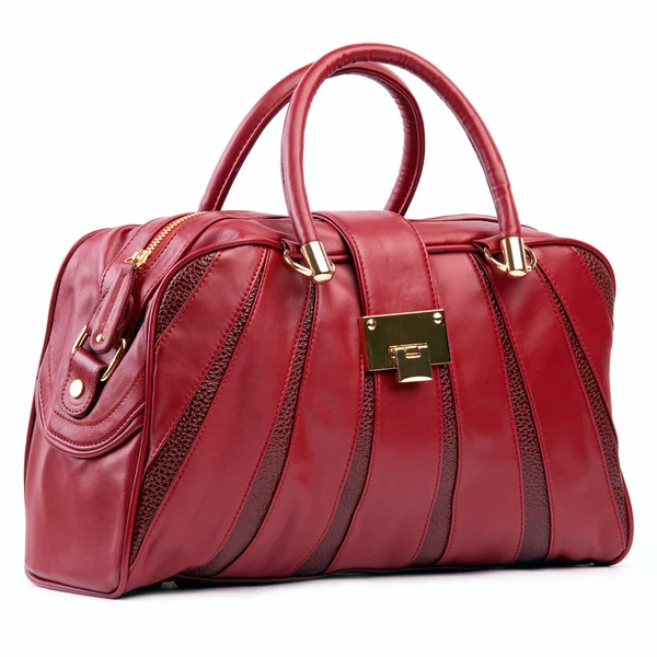 Röd kvinnliga väska över vit bakgrund — Stockfoto