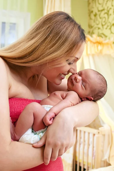 Young beautiful mother and newborn baby boy — Stock Photo, Image