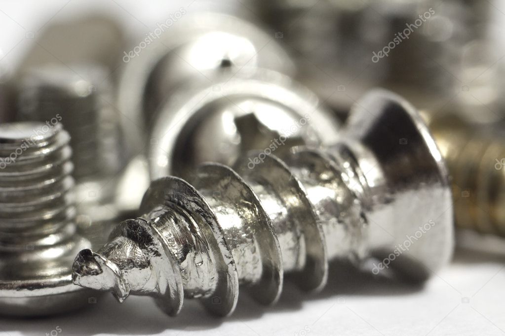 Macro of shiny screws for computer (shallow depth of field)