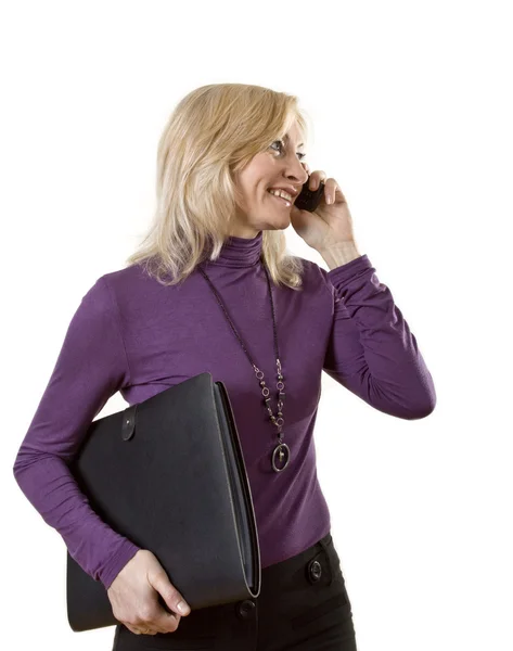 Mulher de negócios com telefone e pasta — Fotografia de Stock
