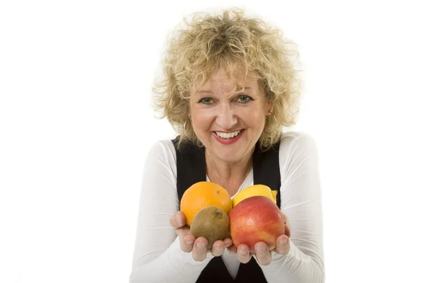 stock image Middle aged lady with fruits
