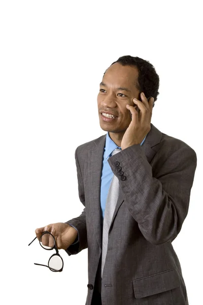 Hombre de negocios inteligente con teléfono móvil — Foto de Stock