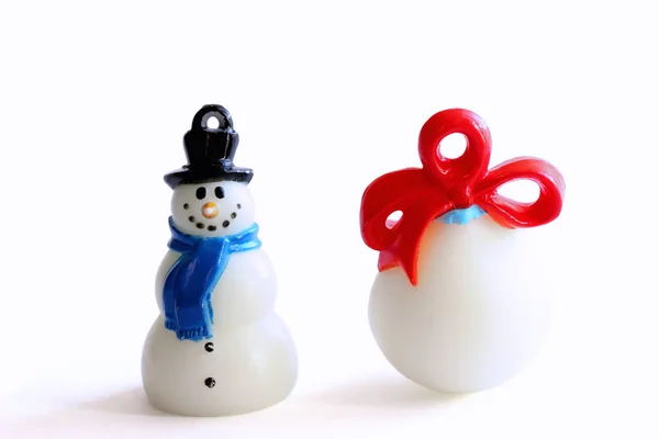 Pupazzo di neve di plastica e regalo — Foto Stock