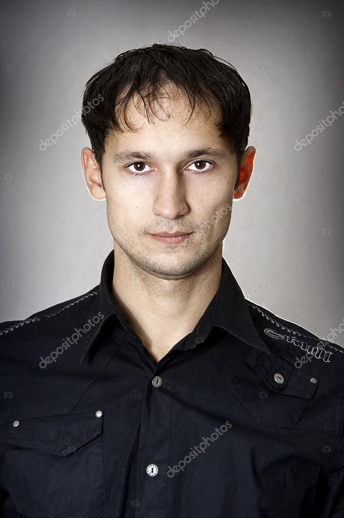 Closeup portrait of young serious man with stubble — Stock Photo ...