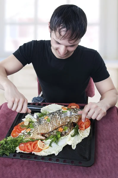 Hungry young man waiting to eat — Stock Image Hungry young man waiting to eat Stock Photo