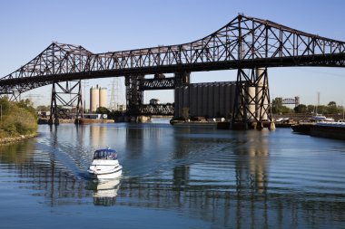 Boat under Chicago Skyway clipart