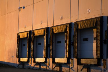 Golden light on the warehouse clipart