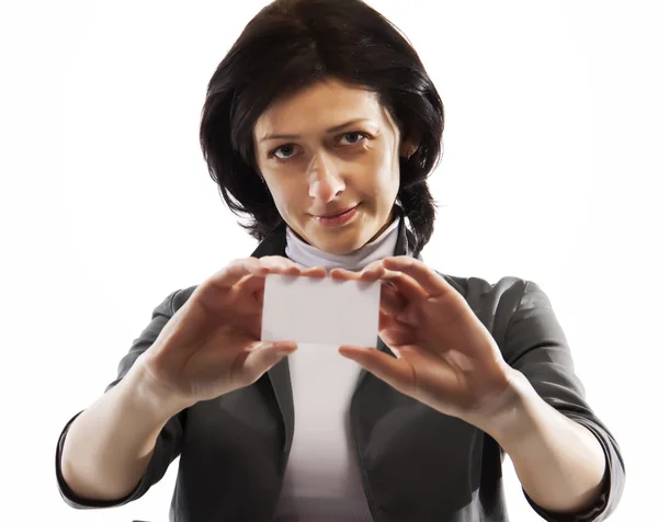 A woman holds in her hands and shows a business card — Stock Photo, Image