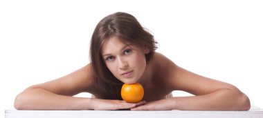 The woman with an orange fruit the isolated image