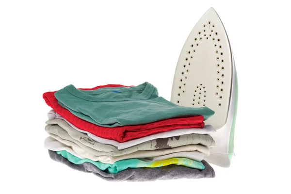 Iron and stack clothes — Stock Photo, Image