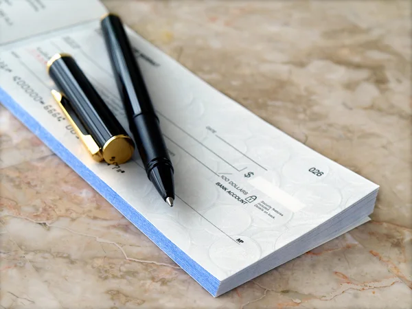 Cheque with pen. — Stock Photo, Image