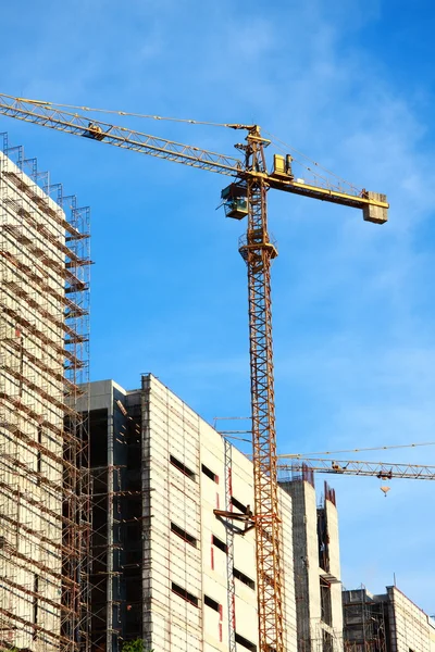 stock image Crane building construction with blue sky background