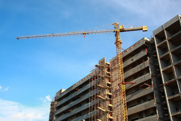 stock image Crane building construction with blue sky background