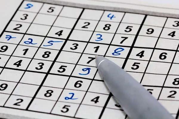 Sudoku avec stylo Photos De Stock Libres De Droits