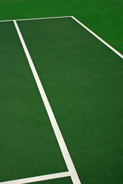 Zelený tenisový kurt — Stock fotografie
