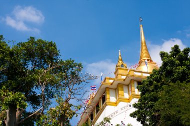 Altın dağ konumlar. Parlak üzerinde Bangkok tapınaklar