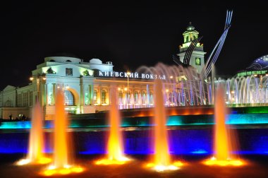 Kievsky Station And Fountain Rape Of Europe In Moscow At Night. clipart