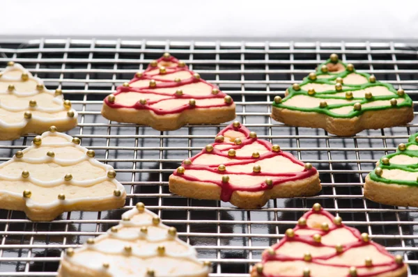 Decorated christmas cookies on the backing tray — Stock Photo, Image