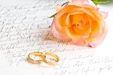 Rose, rings over handwritten love letter clipart