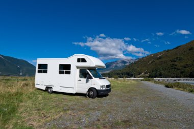 Campervan on a rest area clipart