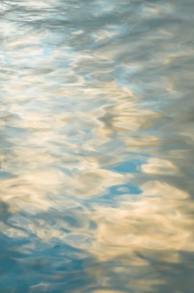 stock image Blue sky reflections in a lake right before a thunder storm