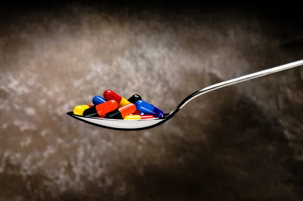 Una cucharada de medicación, pastillas — Foto de Stock