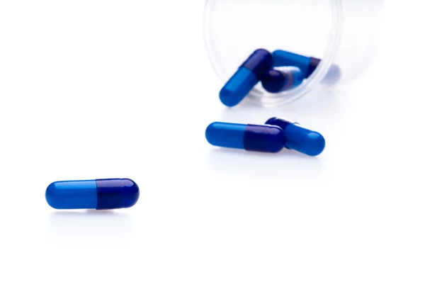 One container spilled pills — Stock Photo, Image