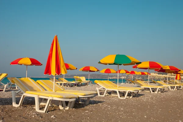 stock image Sun beds and umbrellas