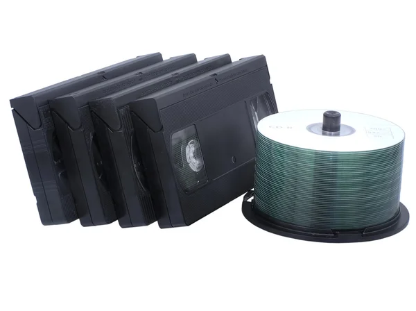 Retro video tapes and CD stack — Stock Photo, Image