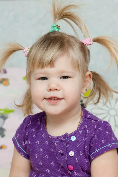 Stock image Little girl with funny tails