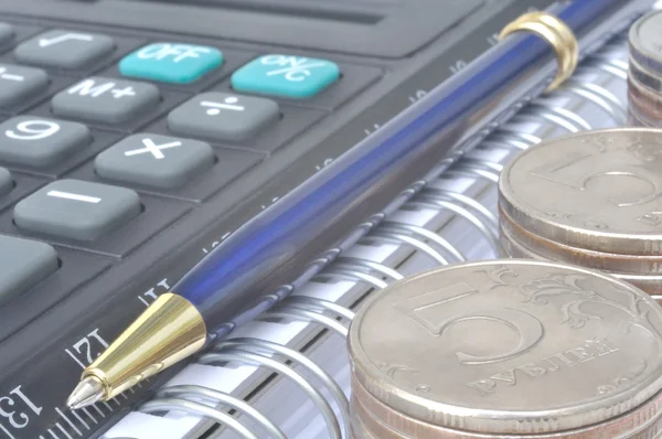 Calculator and coins — Stock Photo, Image