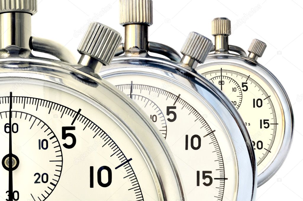 Three old mechanical stopwatch against white background